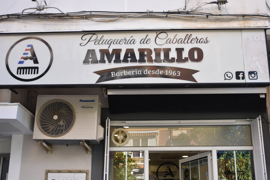 Fachada peluquería amarillo