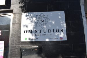 cartel om studio barbershop
