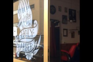 frente barberia logo