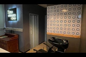 interno barberia lavado cabeza