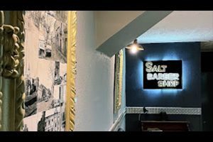 interno barberia logo