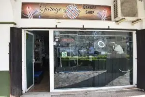 Fachada the garage barber shop