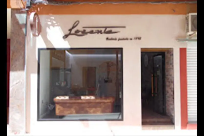 barberia frente logo