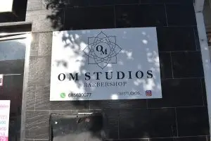 cartel om studio barbershop