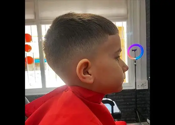 corte niño blessed barber