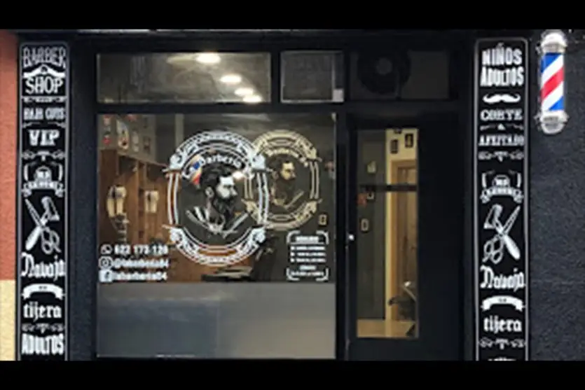frente fachada barberia logo